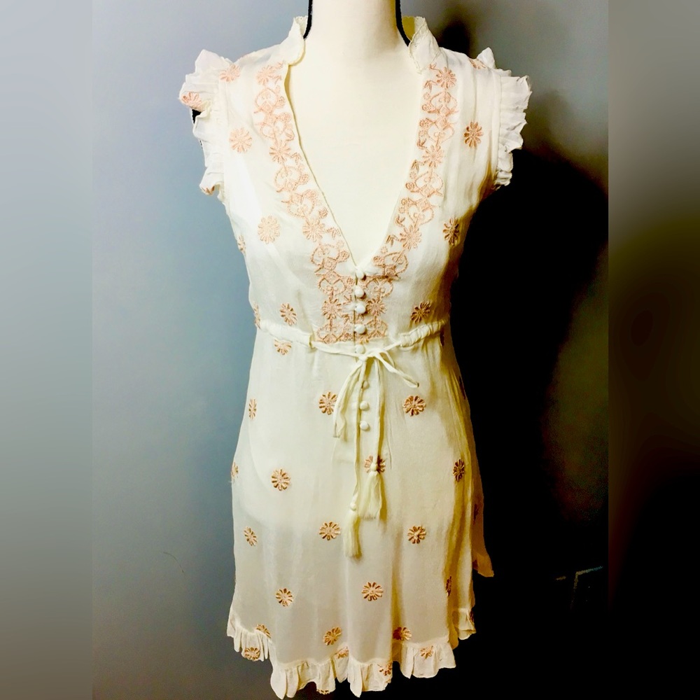Miss June. NWT. Cream and pink ruffle dress with tie belt.
